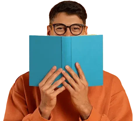 Image of a Latino man holding a book and smiling. This photo is promoting Ontario Library's City of Readers campaign.